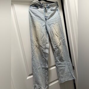 Women’s size 6 high waisted and wide leg pair of jeans